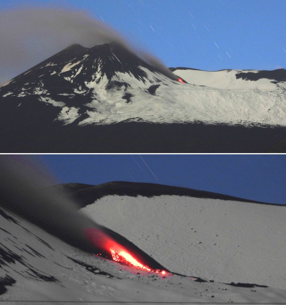Figura 1 - La prima sera della nuova attività effusiva al Cratere di Sud-Est dell’Etna, 12 maggio 2022. Il flusso lavico è molto piccolo e lento, avendo raggiunto una lunghezza di poche decine di metri. Un pennacchio di cenere si alza dal fianco settentrionale del Cratere di Sud-Est. La vista è da Fornazzo, sul versante orientale etneo. Fotografia di Boris Behncke.
