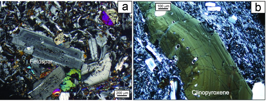 Figura 2 – a. Immagine al microscopio da petrografia di un cristallo di feldspato zonato appartenente ai prodotti vulcanici dell’eruzione di Zaro. Da Pelullo et al. (2020). b. Immagine al microscopio da petrografia di un cristallo di pirosseno zonato appartenente ai prodotti vulcanici dell’eruzione di Arso, isola di Ischia. Da Iovine et al. (2017a).